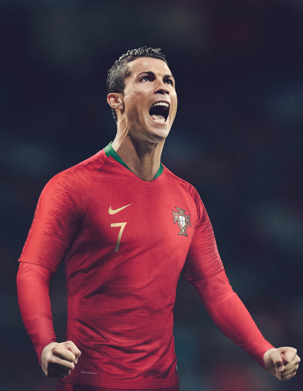 Real Madrid's Portuguese forward Cristiano Ronaldo celebrates after scoring on a penalty kick during the Spanish league football match Real Madrid CF vs Villarreal CF at the Santiago Bernabeu stadium in Madrid on March 1, 2015. AFP PHOTO/ DANI POZO (Photo credit should read DANI POZO/AFP/Getty Images)